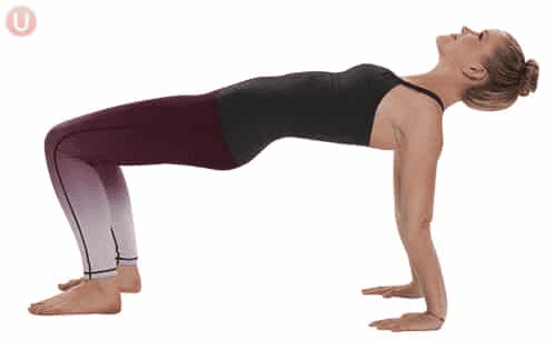 woman demonstrating reverse tabletop exercise pose