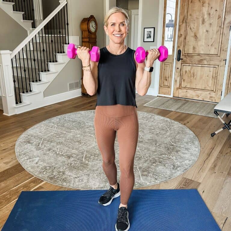 woman showing exercises to tone your arms without push ups